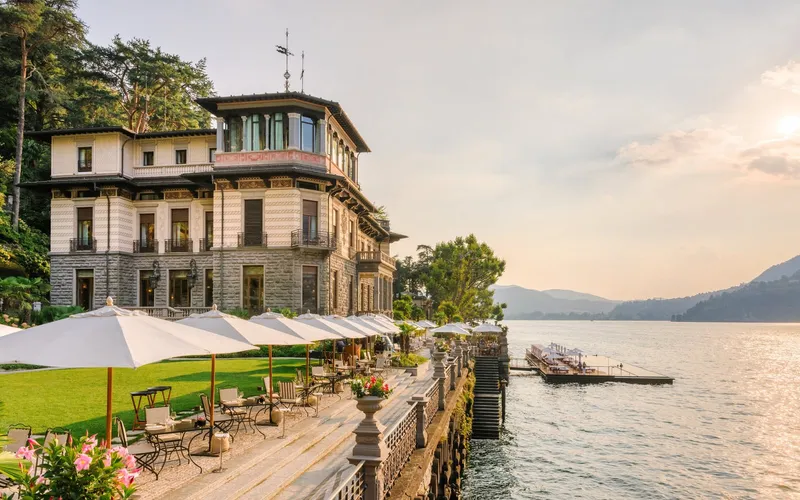 A villa terrace and pier at Mandarin Oriental Lago di Como, a Lake Como hotel in Blevio
