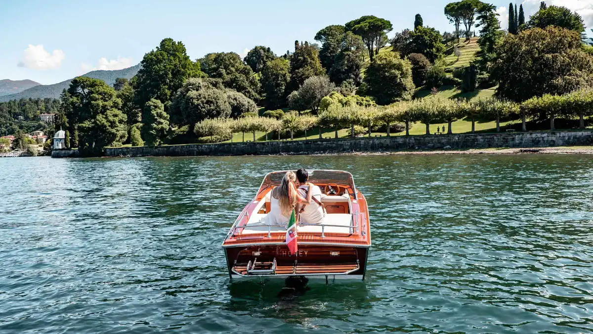 Vintage wooden Cadenazzi speedboat moored at Tremezzo on Lake Como