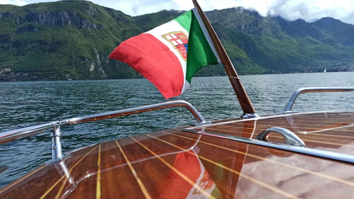 Classic wooden boat on a private trip on Lake Como from Bellagio and Menaggio